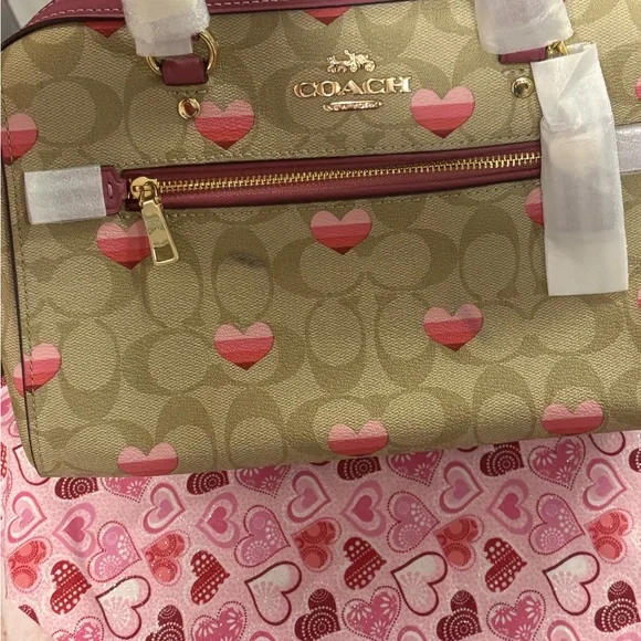 Coach Tan and Pink Heart Print Rowen Satchel and matching wallet - Picture 1 of 8